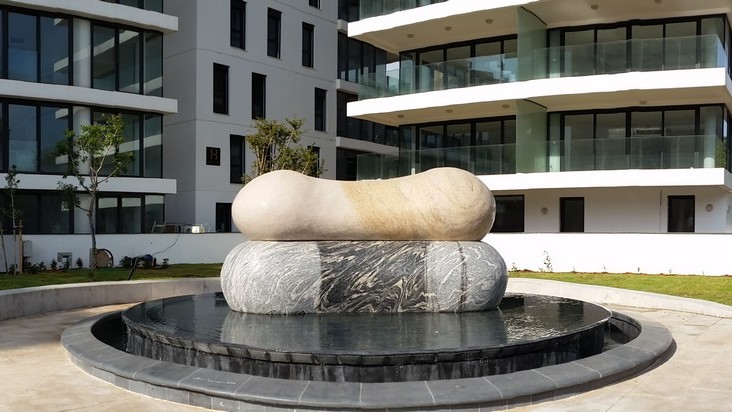 Encounter, a granite and water memorial sculpture in Gan Micha, Tel Aviv
